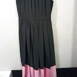 MSGM elegant pleated black dress with pink border.